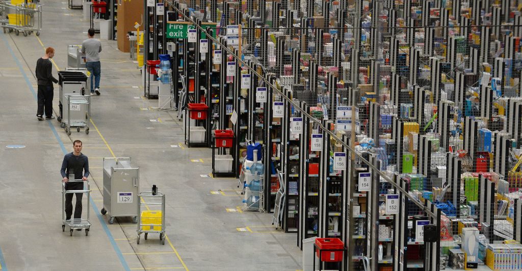 Amazon warehouse workers walk out over pay