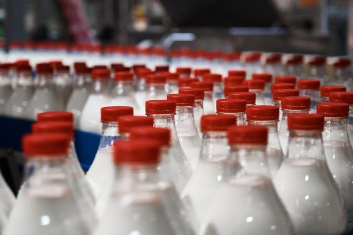 Co-op to remove coloured milk bottle tops to increase recyclability